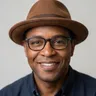 person with hat and glasses